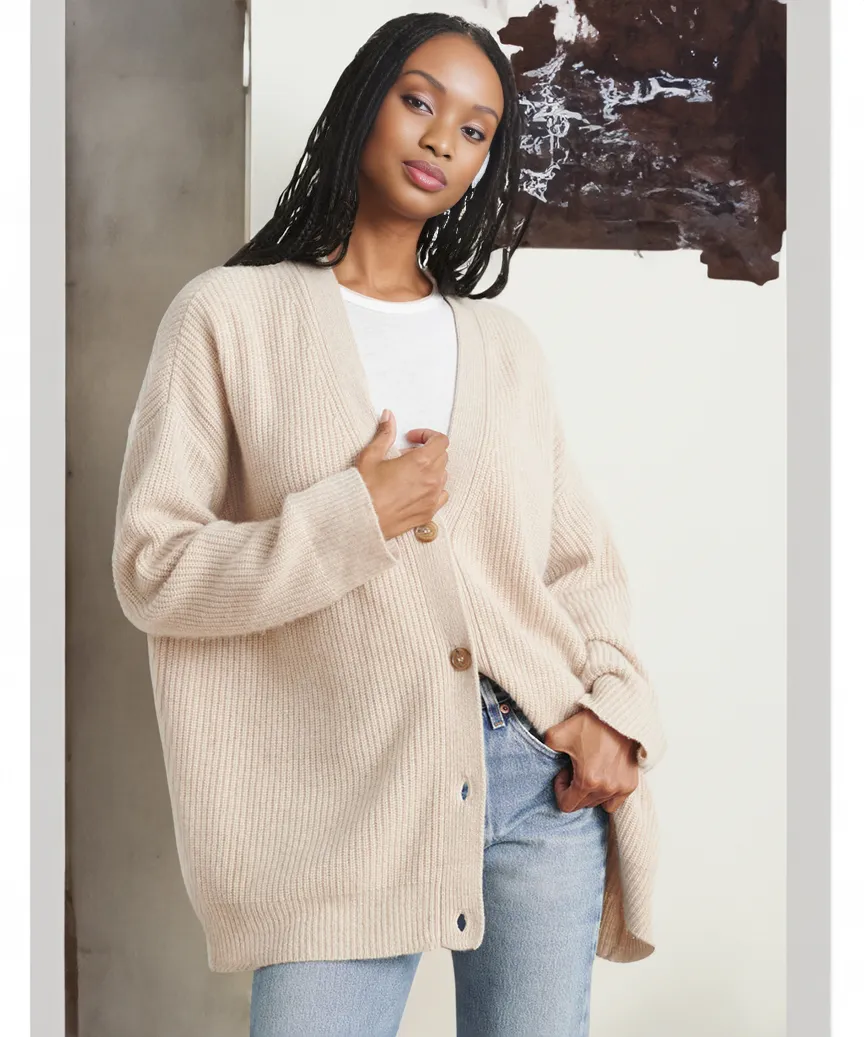 Model wearing Rex Rabbit Hair Cocoon Cardigan in a cozy home setting
